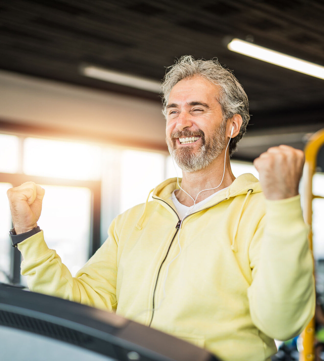 Happy mature men getting those gains in the gym.