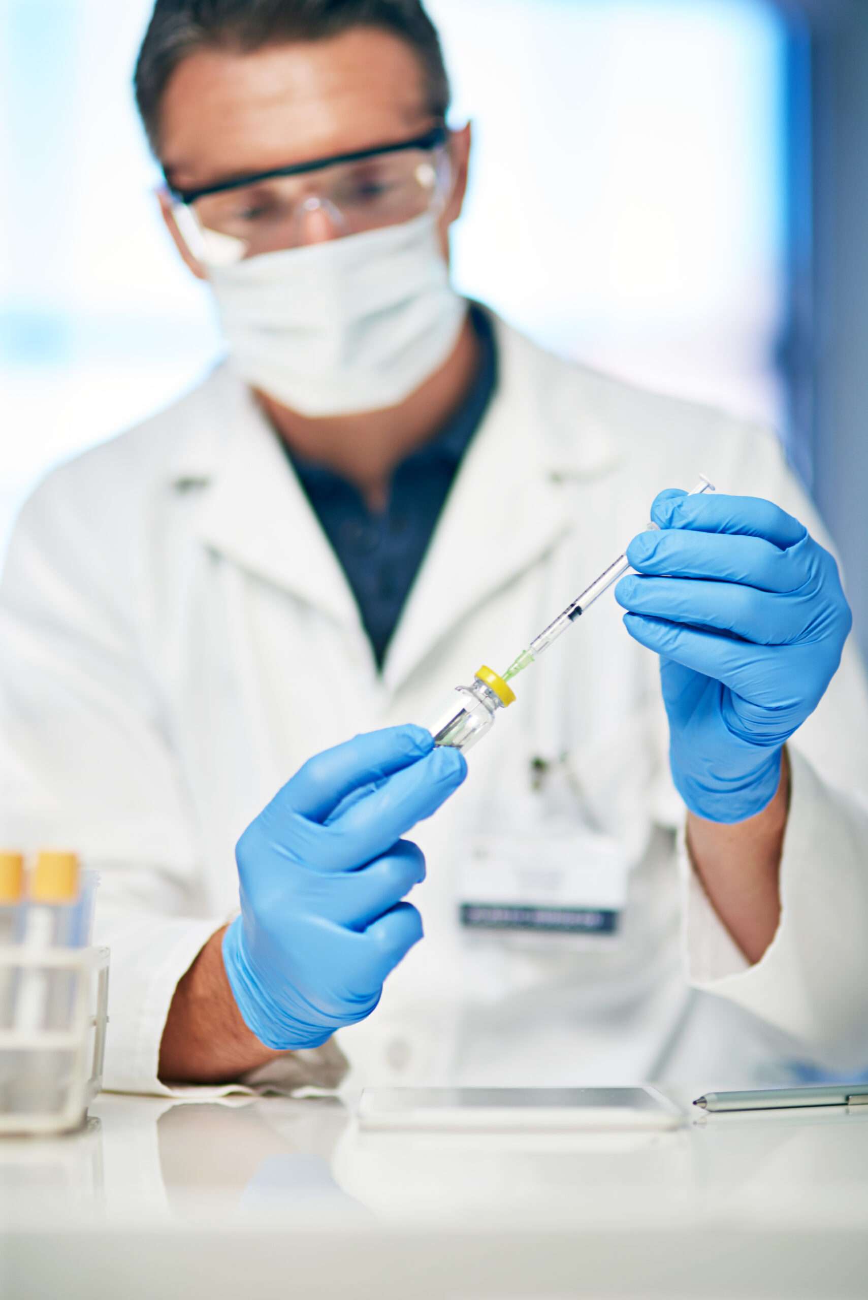 A doctor preparing a Trimix injections for a patient, illustrating the professional administration of this effective erectile dysfunction treatment